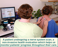 A patient undergoing a nerve system scan, a non-invasive health evaluation which helps us monitor patients' progress throughout their care.